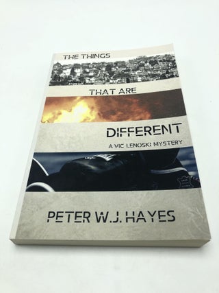 Item #7480 The Things That are Different: A Vic Lenoski Mystery. Peter W. J. Hayes